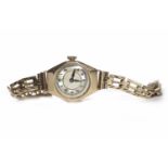 LADY'S MID TWENTIETH CENTURY NINE CARAT GOLD WRIST WATCH converted to quartz,