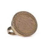 GOLD HALF SOVEREIGN DATED 1914 mounted in a nine carat gold ring, 8.