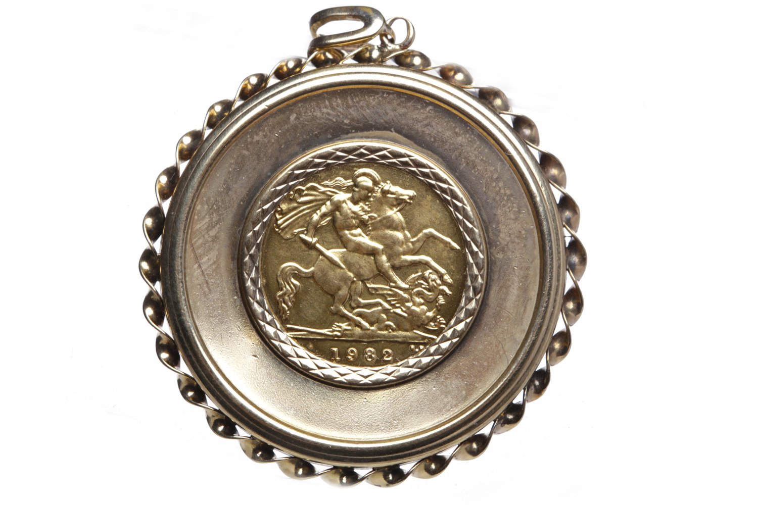 GOLD HALF SOVEREIGN DATED 1982 in a nine carat gold pendant mount, unsoldered, 8.