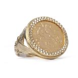 GOLD HALF SOVEREIGN DATED 2001 mounted in a nine carat gold ring, unsoldered, 8.