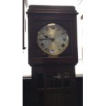 EARLY 20TH CENTURY STAINED MAHOGANY CHIMING LONGCASE CLOCK the silvered dial with Roman numerals,