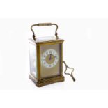 EARLY 20TH CENTURY CARRIAGE CLOCK the enamel chapter ring with Arabic numerals, blued steel hands,