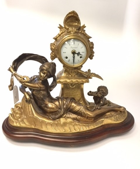 HEAVY GILT BRASS MANTEL CLOCK the circular enamel dial with Roman numeral chapter ring and two