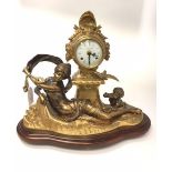 HEAVY GILT BRASS MANTEL CLOCK the circular enamel dial with Roman numeral chapter ring and two