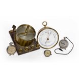 BRASS CASED ANEROID BAROMETER signed on the dial 'C.W.