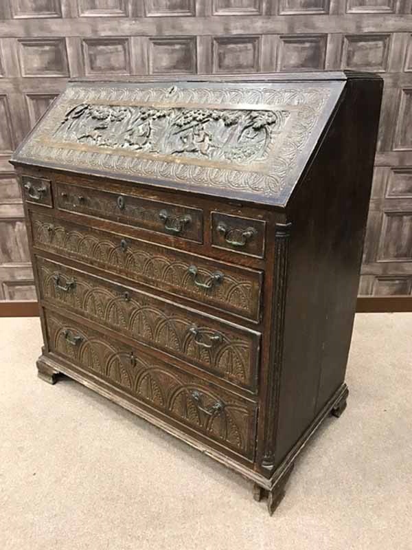 18TH CENTURY OAK BUREAU with later carved decoration, fitted interior,