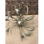 SILVERISED STEEL CHANDELIER OF ART DECO DESIGN with two rows of scrolling branches issuing from two