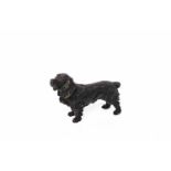 20TH CENTURY COLD-PAINTED BRONZE FIGURE OF A DOG modelled as a standing black field spaniel,