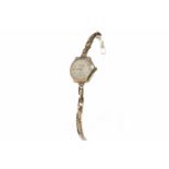 LADY'S MID TWENTIETH CENTURY NINE CARAT GOLD MANUAL WIND WRIST WATCH unsigned 15 jewel movement,