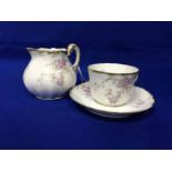 LIMOGES TEA SET twelve cups, twelve saucers, twelve side plates, two serving dishes,