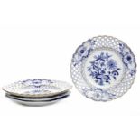 TWO PIERCED BLUE AND WHITE ONION PATTERN PLATES with glazed crossed sword mark to underside of each,