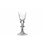 GEORGE II BALUSTROID WINE GLASS with round funnel bowl etched with grapes and vines,