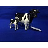 BESWICK FRIESIAN COW AND CALF FIGURES