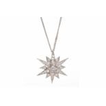 VICTORIAN STYLE EIGHTEEN CARAT WHITE GOLD DIAMOND SET STAR PENDANT set with a central round