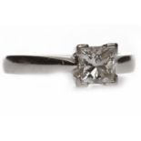 PLATINUM DIAMOND SOLITAIRE RING with a four claw set princess cut diamond of approximately 1.