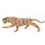 EIGHTEEN CARAT GOLD DIAMOND AND RUBY SET PANTHER MOTIF BROOCH the body of the panther with grain