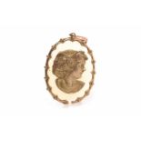 NINE CARAT GOLD CHALCEDONY CAMEO STYLE PENDANT formed by a large oval section of white chalcedony