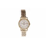 LADY'S LONGINES GOLD PLATED QUARTZ WRIST WATCH the round white dial with Roman numerals in black,