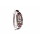 ART DECO RUBY AND DIAMOND COCKTAIL WATCH unsigned 15 jewel movement,