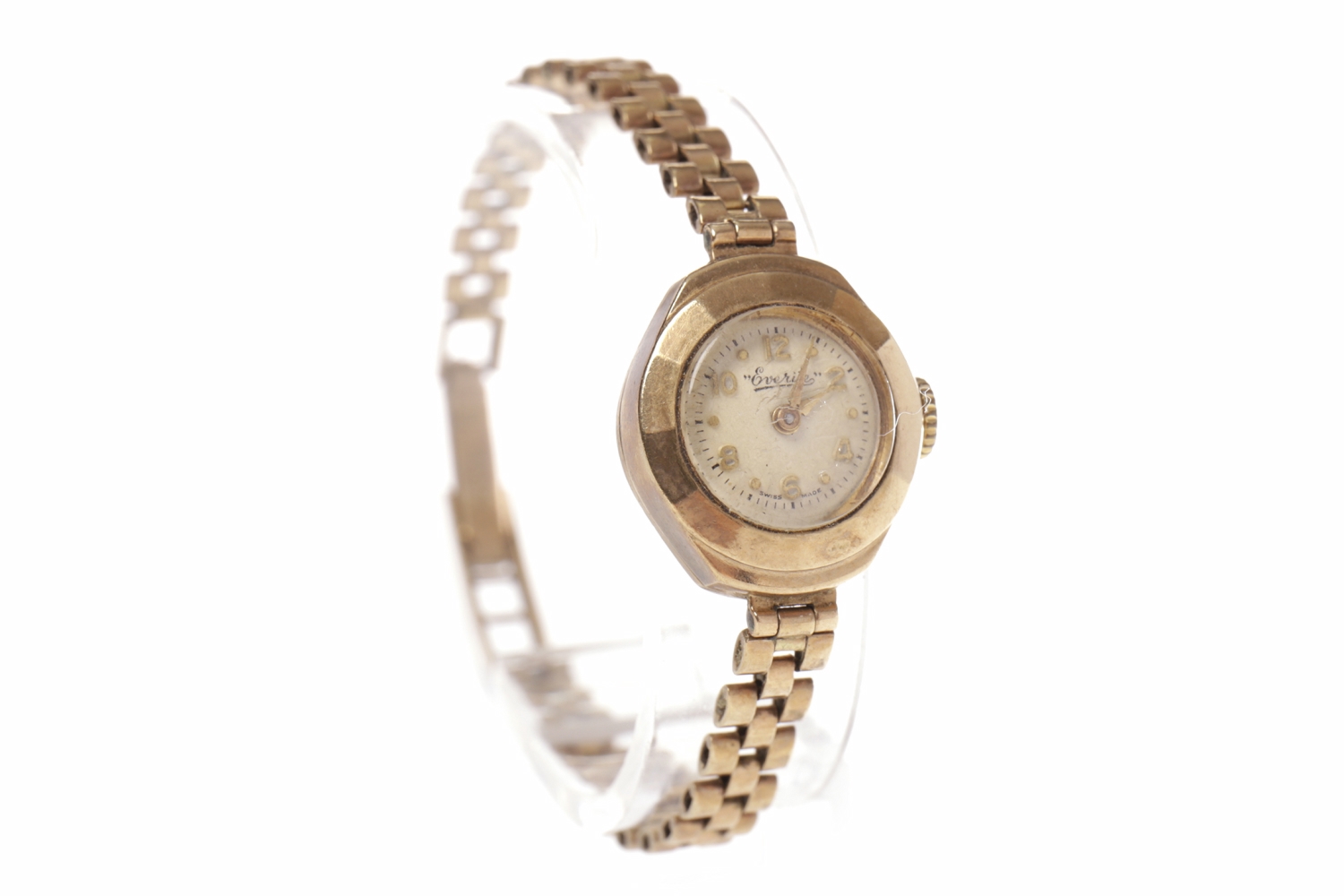 LADY'S NINE CARAT GOLD MANUAL WIND EVERITE WRISTWATCH the round white dial with applied gold