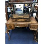 MAHOGANY LEATHER TOPPED WRITING DESK along with a shortened whatnot and a mirror