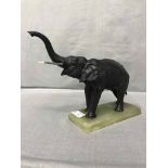 FIGURE OF AN ELEPHANT along with an early twentieth century bear and a letter address press (3)