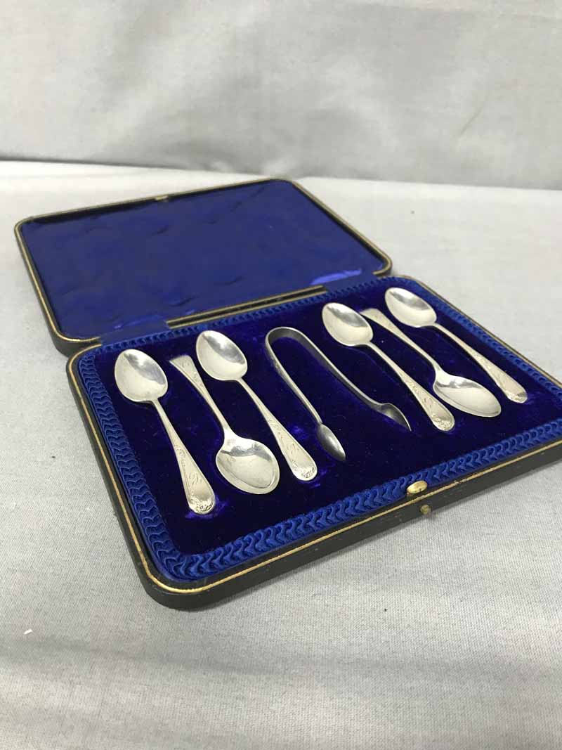 CASED SET OF SILVER TEASPOONS along with a cased set of silver knives (2)