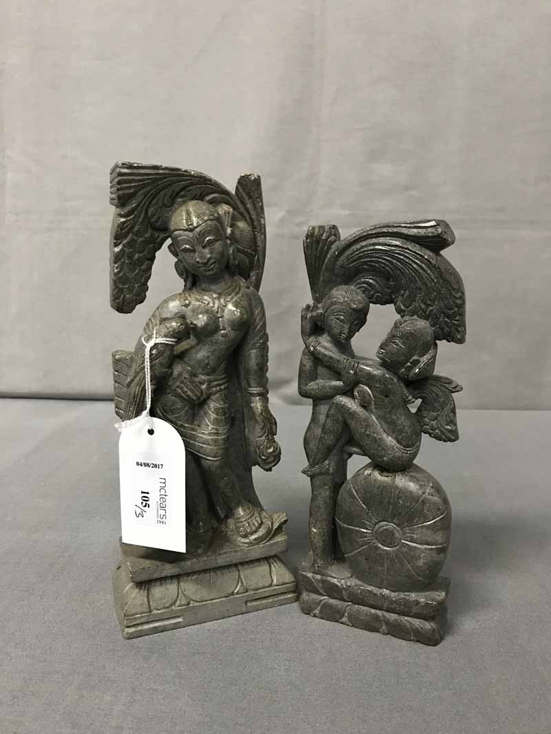 PAIR OF 20TH CENTURY INDIAN SOAPSTONE FIGURINES one showing two figures in an erotic embrace,