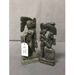 PAIR OF 20TH CENTURY INDIAN SOAPSTONE FIGURINES one showing two figures in an erotic embrace,