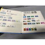 INTERESTING LOT OF STAMPS CONTAINED IN FOUR ALBUMS