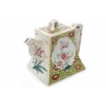 20TH CENTURY CHINESE FAMILLE ROSE TEA POT of rectangular form with painted floral designs,