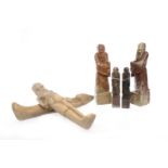 FOUR 20TH CENTURY CHINESE SOAPSTONE FIGURES each modelled as a standing male,