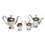 CHINESE SILVER FOUR PIECE TEA SERVICE comprising tea pot, water pot, sugar and cream,