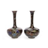 PAIR OF EARLY 20TH CENTURY CHINESE CLOISONNE VASES with long slender necks and everted rims,