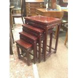 20TH CENTURY CHINESE NEST OF FOUR WOODEN TABLES the tallest 65 cm