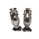 PAIR OF CHINESE SILVER DOUBLE HANDLED LOBED BALUSTER VASES decorated with six upright panels