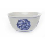 EARLY 20TH CENTURY CHINESE BLUE AND WHITE TEA BOWL with floral designs and mark to base, 7.