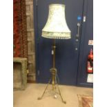 BRASS TELESCOPIC FLOOR LAMP the tassled shade with floral and foliate decoration,