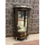 KINGSWOOD AND GILT METAL MOUNTED VITRINE OF SERPENTINE OUTLINE companion cabinet to previous lot,