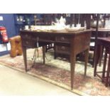 EDWARDIAN MAHOGANY OBLONG WRITING TABLE OF SHERATON DESIGN the central freize drawer flanked by two