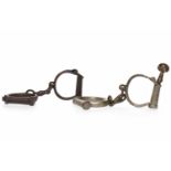 PAIR OF HIATT 'D' WARRENTED WROUGHT POLICEMAN'S HANDCUFFS maker's mark and number 56 to the side;