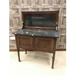 EDWARDIAN MAHOGANY WASHSTAND WITH BLACK MARBLE TOP AND SPLASHBACK cupboard below enclosed by two