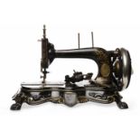 EARLY 20TH CENTURY FRISTER AND ROSSMAN FREE-STANDING SEWING MACHINE cast metal and enamel,