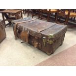 LARGE RECTANGULAR LEATHER TRAVEL TRUNK with brass fittings and studs, leather straps,