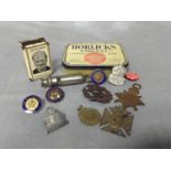 LOT OF MILITARIA AND COLLECTABLES including enamel badges, cap badges, 1914-15 medal, tin,