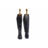 PAIR OF MID-19TH CENTURY BLACK LEATHER RIDING BOOTS with wooden trees carved 'R' and 'L',