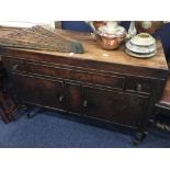 GEORGE III MAHOGANY OBLONG WASHSTAND the hinged cover revealing an interior with six open rings,