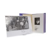 CONCERT FOR GEORGE MEMORABILIA comprising booklet which has been signed by featured artists at the