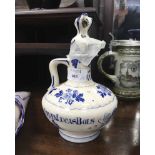 DELFT ERVEN LUCAS BOLS BLUE AND WHITE JUG and a Dresden figure group,