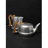 LOT OF PICQUOT WARE comprising two tea pots, water jug, two cream jugs and a sugar bowl,